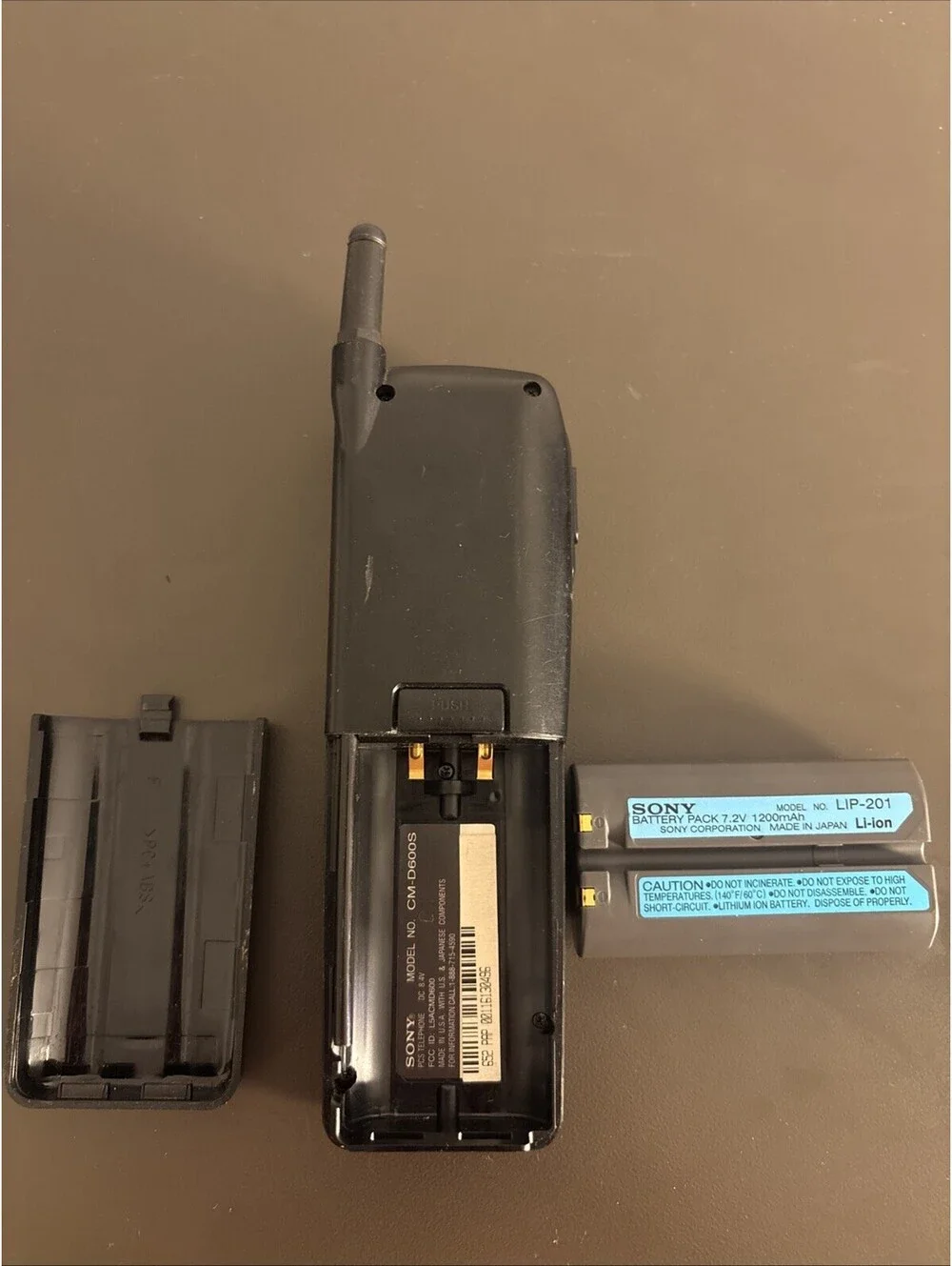 Vintage Sony CM-D600S Flip Up Top Candy Bar Cell Phone Sprint - Untested